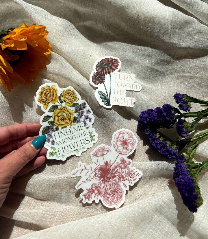 Find Me Among the Flowers Sticker